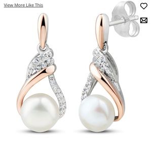 Freshwater cultured Pearl & white lab created sapphire earrings.